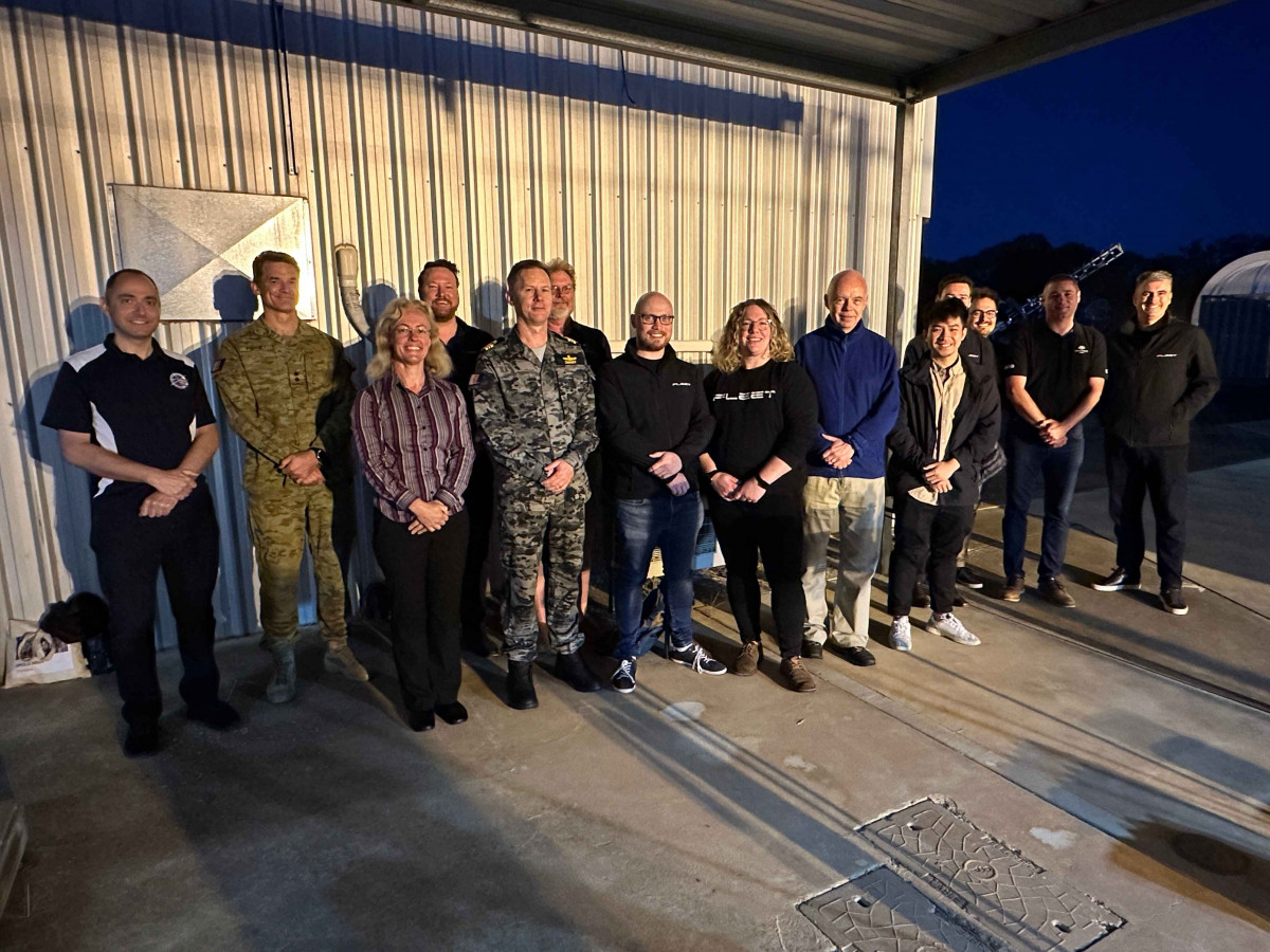Defence, industry and academic partners at the early-morning demonstration of the ‘push-to-talk’ voice over SATCOM demonstration at DSTG Edinburgh.