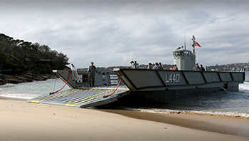 Commander Surface Force, Commodore Jonathan Mead, AM, RAN visits a Landing Helicopter Dock (LHD) Landing Craft to witness its capability.