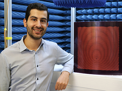 Joel Patniotis in an anechoic chamber with a sample DSTG-designed artificial impedance surface. One day reconfigurable antenna surfaces like this could be embedded in the surface of air, sea and land platforms.