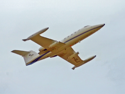 Lear jet with ASRAAM guidance section mounted in pod under starboard wing (LHS of photo) and camera for recording test environments in infrared imagery mounted in pod under port wing (RHS of photo).