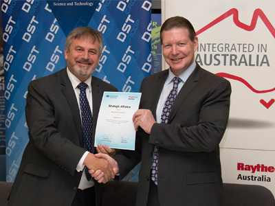 Dr Alex Zelinsky and Mr Michael Ward during the signing at Partnerships Week.