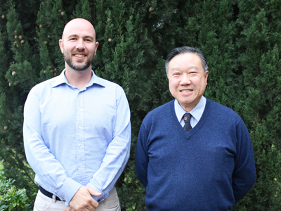 Tony Lau (R) with team member Peter Dawson (L).