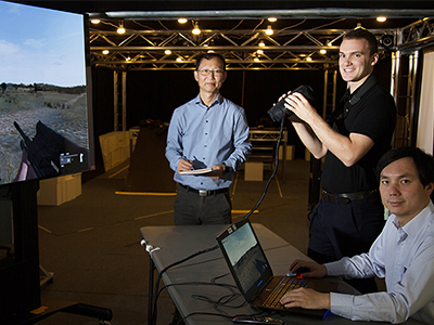Spotting signatures in a virtual landscape Just how does one build a convincing virtual landscape? Defence scientists Dr Bin Lee (LD) and Jay Yu are facing that challenge.