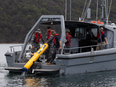 Defence personnel recovering a UUV.