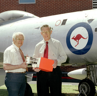 Dave Warren (left) and Ken Fraser with a black box flight recorder prototype.