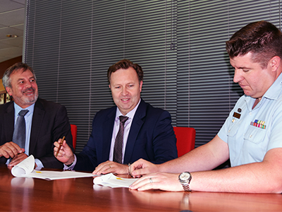 Strategic Alliance signing between DST Group and QinetiQ. (L-R) Chief Defence Scientist Dr Alex Zelinksy, Greg Barsby, Managing Director, Qinetiq and WGCDR Ben Main, Air Force (DGTA).