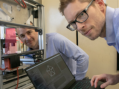 Engineers Tim Teske (left) and Andrew Hart are transforming the production of energetic materials.