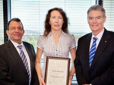 Acting Chief Defence Scientist Dr Warren Harch, Dr Elena Mazourenko and Secretary of Defence Mr Duncan Lewis.