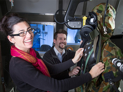 Julia Freeman with colleague Brady Gentle in the environmental test chamber.