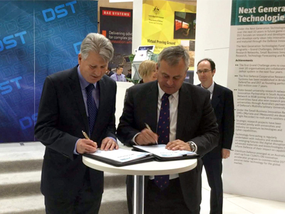 Ben Norris, CEO of Daronmont Technologies and Chief Defence Scientist Dr Alex Zelinsky sign collaboration agreement. 