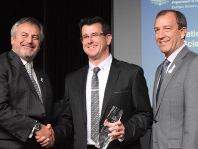 L-R Chief Defence Scientist Dr Alex Zelinsky, Minister's Award winner Dr Mark Patterson, and the Minister for Defence Materiel and Science the Hon Mal Brough MP