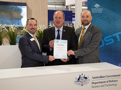 L-R: David Perry, Northrup Grumman USA; Mike Gallagher, Acting CEO Northrup Grumman Australia and Acting CDS Todd Mansell at the signing