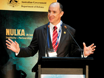 Assistant Minister of Defence, Mr Stuart Robert, MP, launches book Nulka at the Pacific 2013 Maritime Exhibition held at the Sydney Convention Center. 