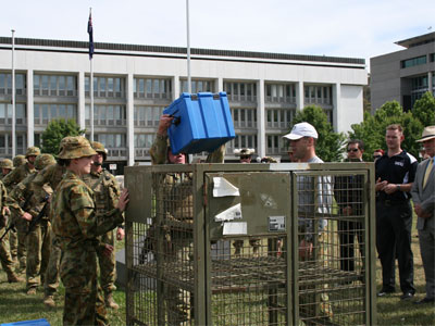 Army members demonstrate lifting tasks.