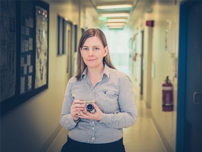 Tania Holmes with one of the high-tech cameras used to capture explosive action. 