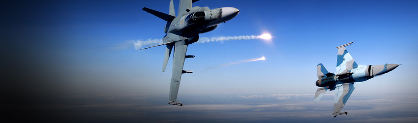 Two jet fighters demonstrate a spin manoeuvre in the sky.