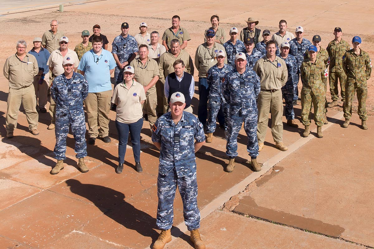 A mix of Defence and industry partners standing at the HiFire launch pad.