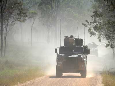 Three Bushmaster on the move during a MTF-3 Mission Rehearsal Exercise prior to deploying to Afghanistan.