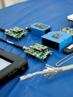 Components and hardware on static display at the demonstration for the Naval Automated Personnel Tracker system.