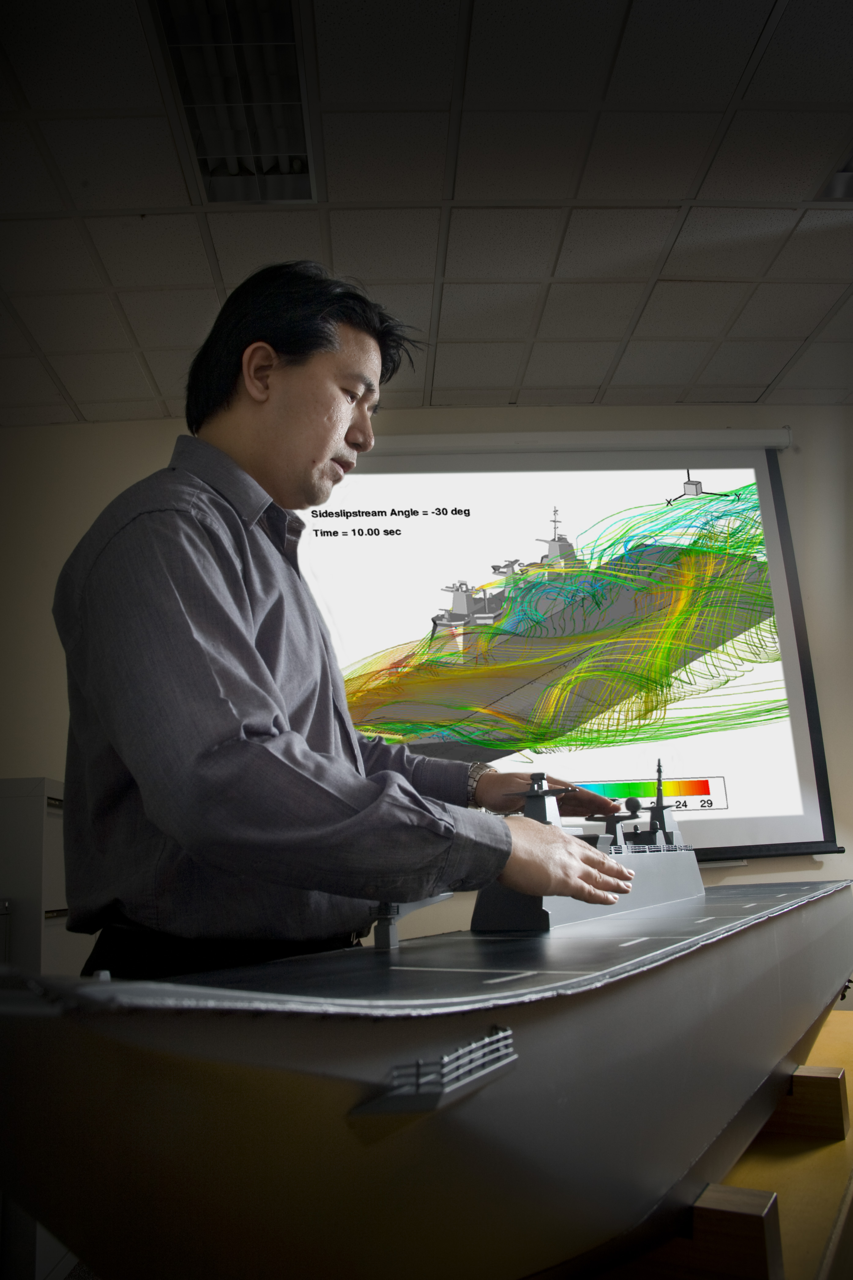 DSTO is undertaking studies to help mitigate risks associated with helicopter operations on the Canberra Class Landing Helicopter Dock ships. By using computational fluid dynamics models, validated by DSTO’s low speed wind tunnel using a 1/100 model of the LHD, researchers can gain a detailed understanding of the flow field around the flight deck.