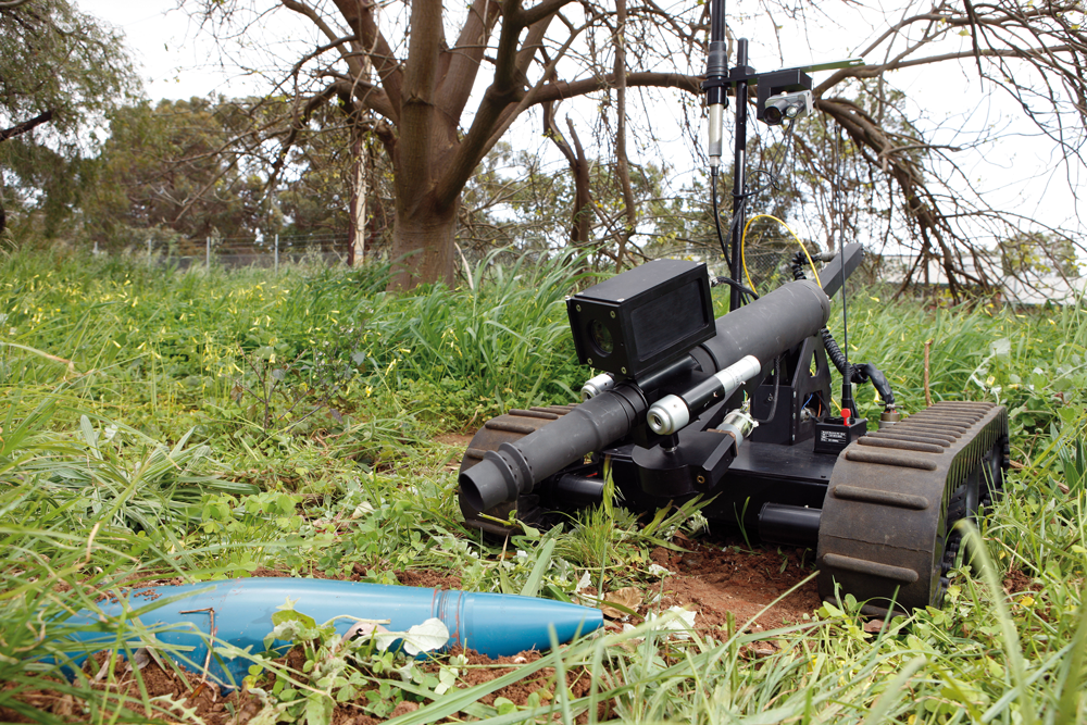 DSTO has designed and successfully demonstrated a number of small Unmanned Systems, including the Spiker remotely controlled tracked robot which deploys a number of different devices to render an Improvised Explosives Device (IED) safe. It has two cameras mounted on the device to allow positioning of the explosive and other devices.