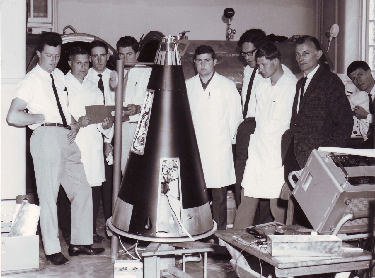 The University of Adelaide team gather round WRESAT. Photo courtesy of Prof John Carver.