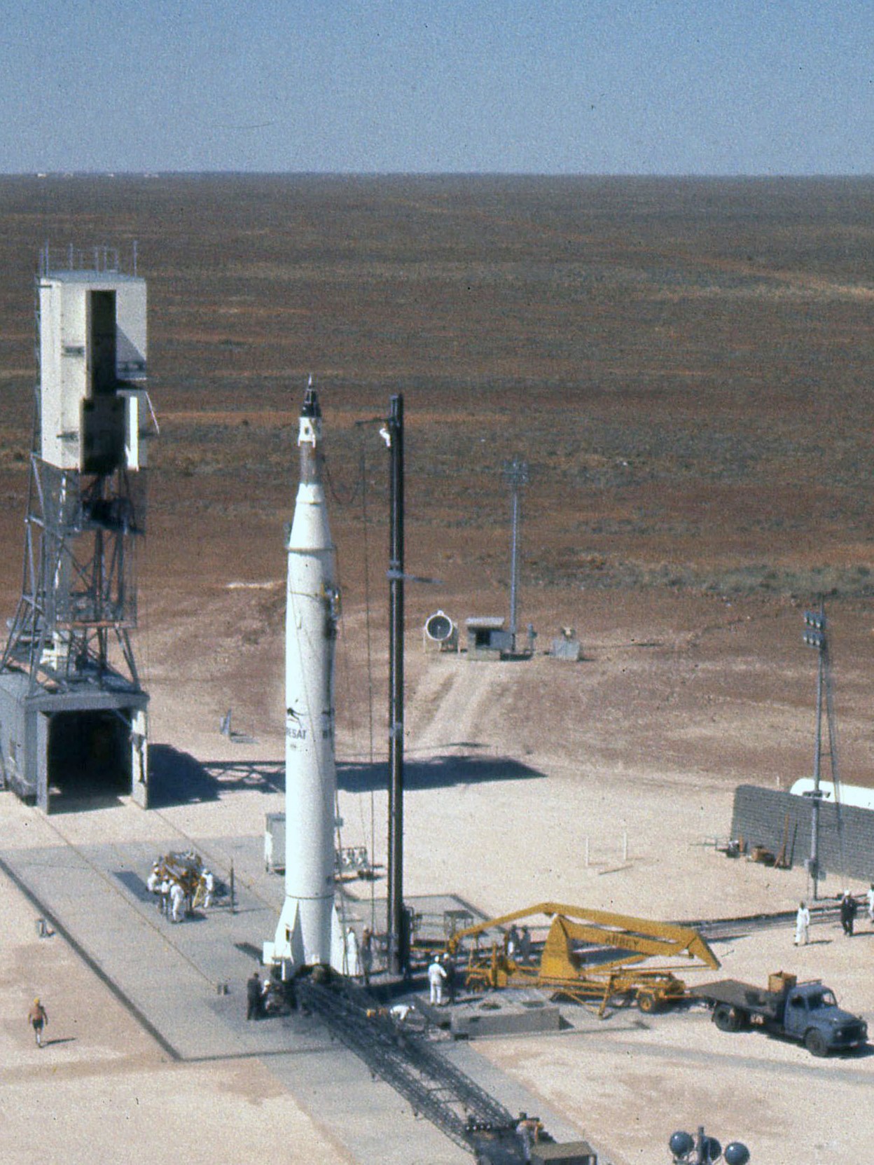 WRESAT in the final stages of launch preparation, with members of the US launch crew carrying out checks. Photo courtesy of Prof John Carver.