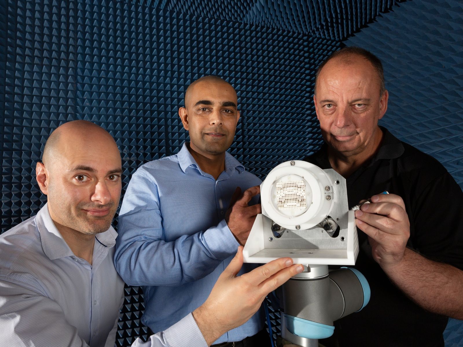 (L-R) Daniel Borg, Dr Manik Attygalle and David Burdon from the MetaSteerers team, showing their award winning low-profile, energy-efficient and steerable antenna system. The MetaSteerers antenna system uses metasurfaces to steer radio frequency signals over a wide area at very high speeds.