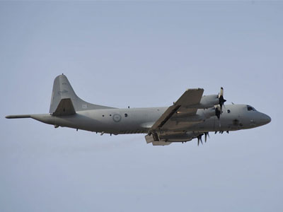 A photograph of an Orion in flight