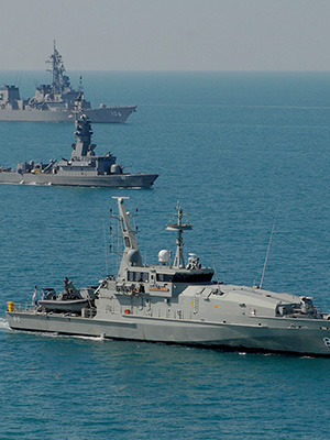 Armidale Class Patrol Boat, HMAS Maitland (foreground) in formation during Exercise Kakadu.