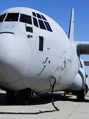 A Royal Australian Air Force C-130J Hercules takes on cargo and fuel at Kandahar Air Field in Afghanistan. A Royal Australian Air Force C-130J Hercules takes on cargo and fuel at Kandahar Air Field in Afghanistan.