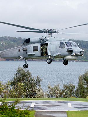 A SeaHawk prepares to land on HMAS Watson to drop off Aviation personal during the International Fleet Review Aviation & Operations working group. A SeaHawk prepares to land on HMAS Watson to drop off Aviation personal during the International Fleet Review Aviation & Operations working group.