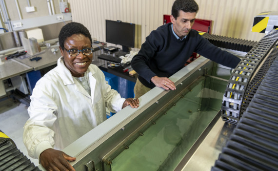 Dr Chirima (left) and fellow researcher Dr Matthew Ibrahim with DSTG’s ultrasonic immersion system which is able to measure the speed of sound, transmission loss and reflection coefficients of Dr Chirima’s material samples which are immersed in the water.