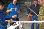 DST Group and Army personnel with the Australian-developed unmanned aerial vehicle, Aerosonde.