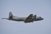 A photograph of an Orion in flight