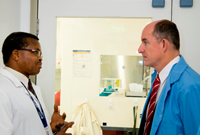 A DSTG scientist providing advice to the Assistant Minister for Defence, Mr Stuart Robert.