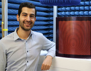 Joel Patniotis in an anechoic chamber with a sample DSTG-designed artificial impedance surface. One day reconfigurable antenna surfaces like this could be embedded in the surface of air, sea and land platforms.