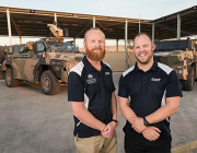 Operations analyst Jeff Seers, left, and science and technology liaison officer Matt Randell at the ADF’s main operating base in the Middle East. Photo: Leading Seaman Craig Walton