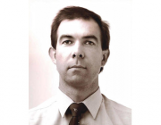 Michael Howlett was killed during an aircraft crash while undertaking his scientific duties. Black and white portrait of Michael Howlett