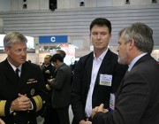 Vice Admiral Robert L. Thomas, Commander of the US Navy 7th Fleet in conversation with CDS Dr Alex Zelinsky (right) and Brendon Anderson, Head DSTO Hydrodynamics.  