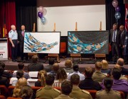 Chief of the Defence Force Air Chief Marshal Mark Binskin, AC, Warrant Officer Class One (Rtd) Roy Mundine, OAM, Chief Defence Scientist Dr Alex Zelinski and Mr Harry Allie unveil the female version of "The Song Cycle of the Seven Sisters" by Artist Anthony Walker during the 'Education as a Life Long Journey' event.