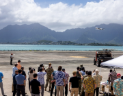 POST 2024 attendees observe a remotely piloted demonstration at Marine Corps Air Station Kaneohe Bay, Hawaii. This was part of the U.S. Indo-Pacific Command's 2024 POST Field Experimentation (POST-FX) conference which brought the region's science, technology and security experts together for field demonstrations, allowing providers to showcase technologies that engage U.S. Indo-Pacific allies and partners.