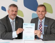 Chief Defence Scientist Dr Alex Zelinsky (left) and Airbus Group Australia Pacific Managing Director Dr Jens Goennemann (right) holding the newly signed strategic alliance.