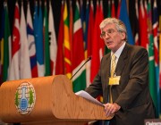 Dr Bob Mathews accepting his award at The Hague. Photo courtesy of Henry Arvidsson/OPCW.