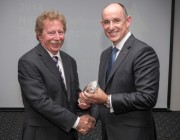 The Assistant Minister for Defence, Stuart Robert (right) awards Dr Stephen Burke with the 2014 Minister’s Award for Achievement in Defence Science.
