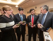 Chief Defence Scientist Dr Alex Zelinsky (right) demonstrates the new counter improvised explosive device (IED) equipment to (from L-R) Senator for Western Australia the Hon Linda Reynolds, Minister for Defence the Hon Kevin Andrews and Ambassador for the Embassy of Afghanistan, H.E Nasir A. Andisha.