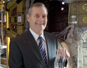 Dr Bruce Hinton with his Minister's aircraft maintenance Award for Achievement in Defence Science.