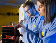 Scientists Alex McDonald and Franke Agenbag working on the Buccaneer CubeSat. Scientists Alex McDonald and Franke Agenbag working on the Buccaneer CubeSat.