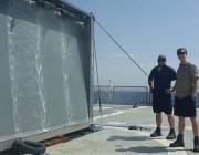 Shannon Keough and Ian Kermonde on the deck of the Greek vessel HS Prometheus, with the Wandjina test article. 