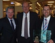 (L-R) Joe Rears, Director Aviation (One Atmosphere), Defence Minister Senator David Johnston and Tim Lyons, Managing Director (One Atmosphere) with the innovation award. 